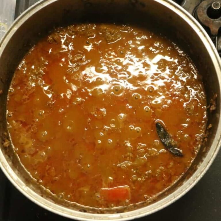 手順 6: 弱火にして５分煮込む。